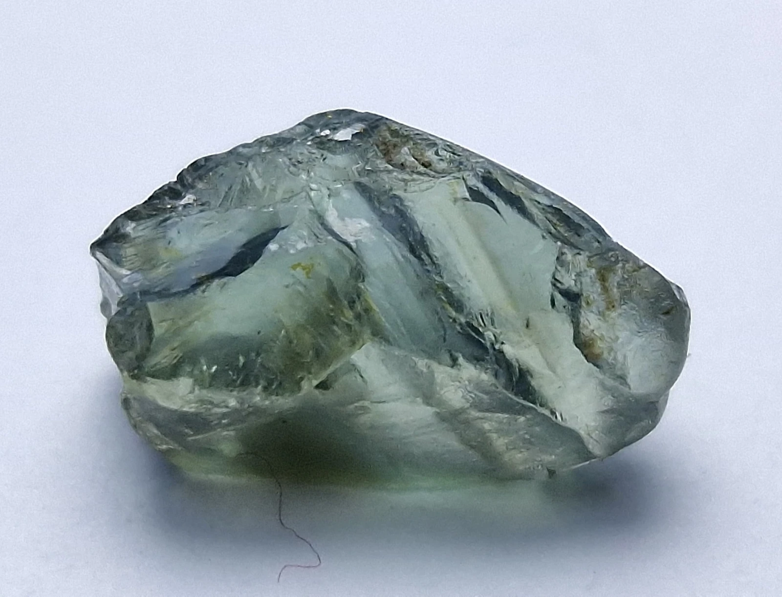 2.2ct Facet Grade Rough Grayish Green Teal Sapphire from Nigeria