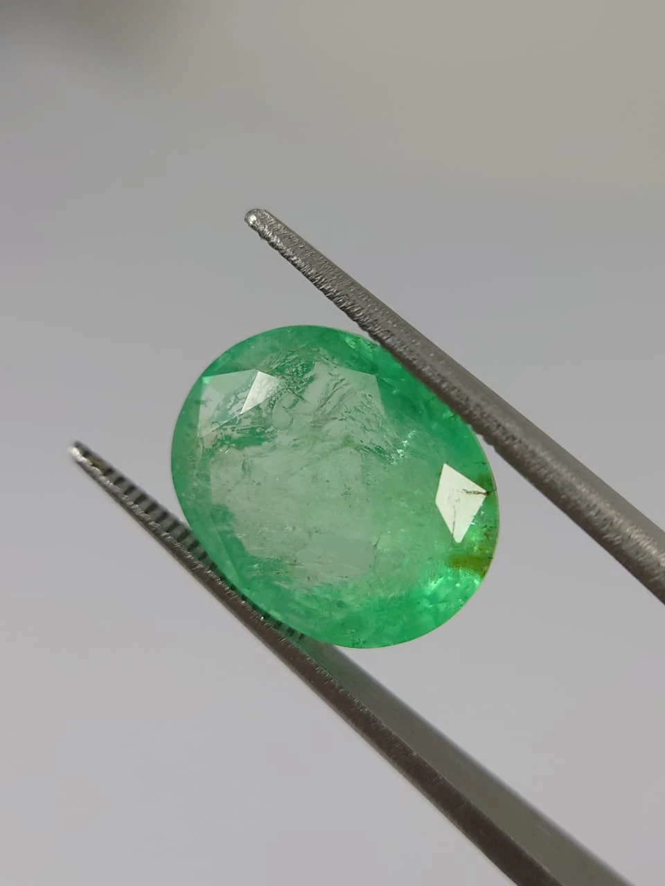 7.7ct Oval Faceted Minor Oiled Panjshir Emerald from Afghanistan