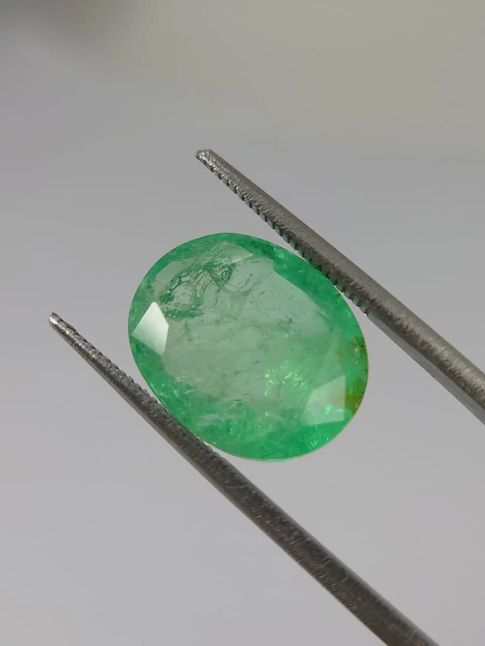 7.7ct Oval Faceted Minor Oiled Panjshir Emerald from Afghanistan
