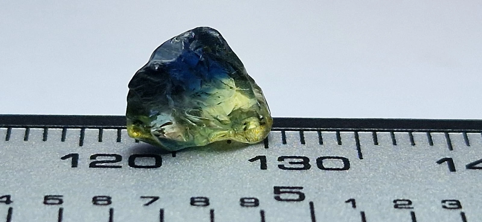 1.95ct Bicolor bluish Green Sapphire from Nigeria