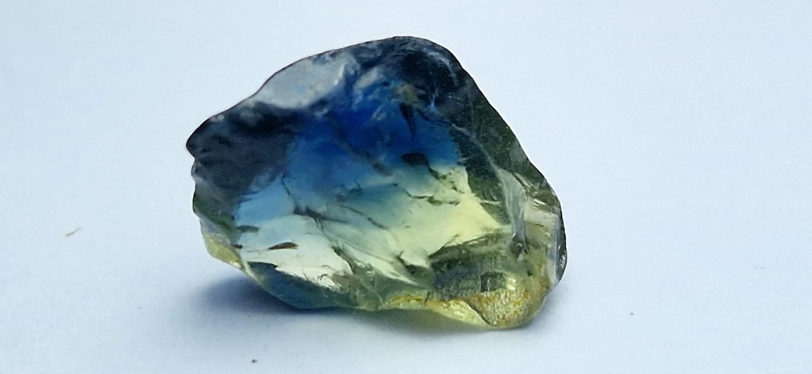 1.95ct Bicolor bluish Green Sapphire from Nigeria
