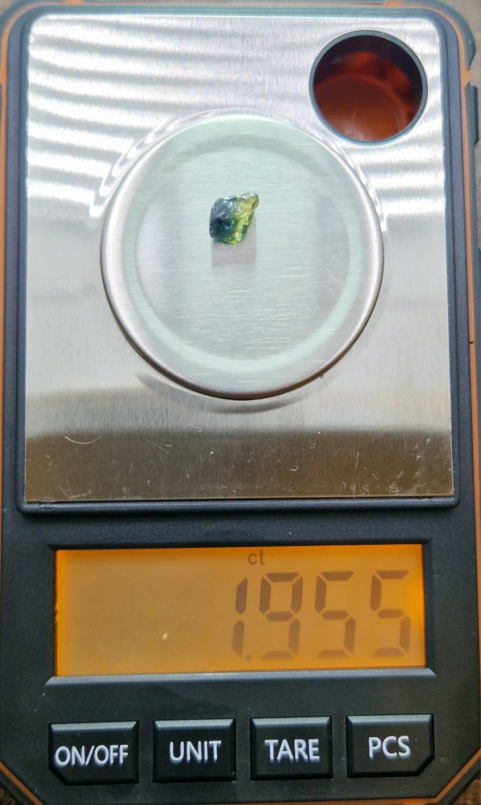 1.95ct Bicolor bluish Green Sapphire from Nigeria