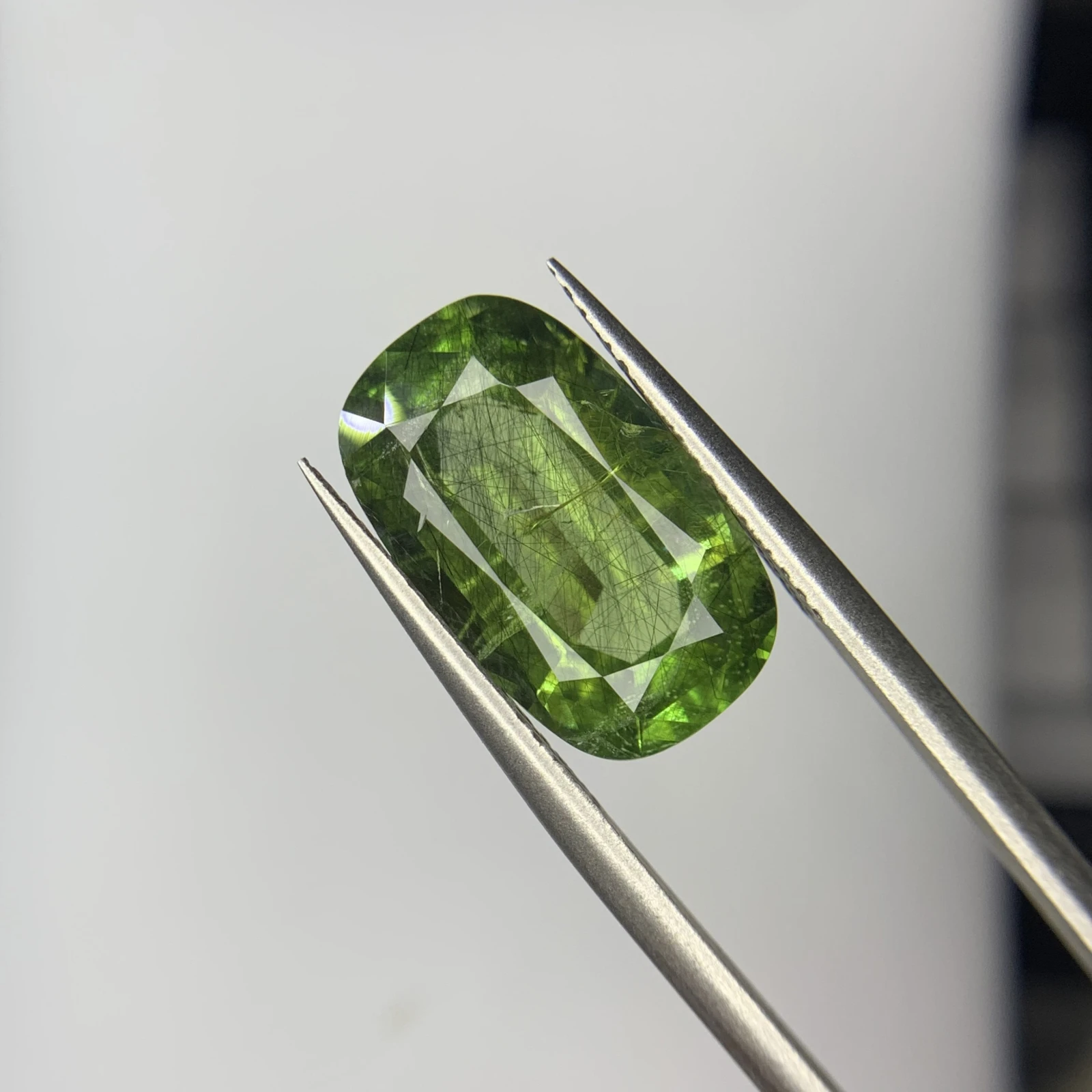 8.40ct Natural Peridot with Ludwigite Inclusion in Cushion Shape from Pakistan
