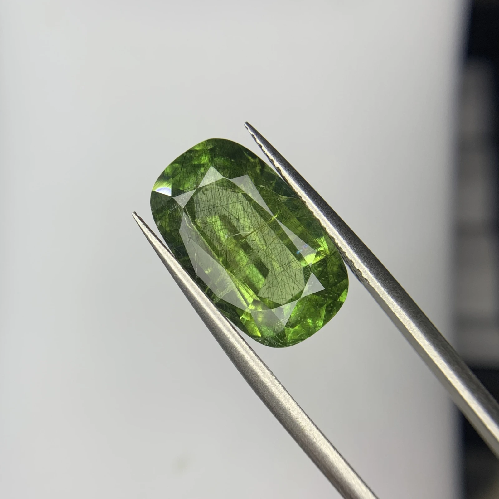 8.40ct Natural Peridot with Ludwigite Inclusion in Cushion Shape from Pakistan