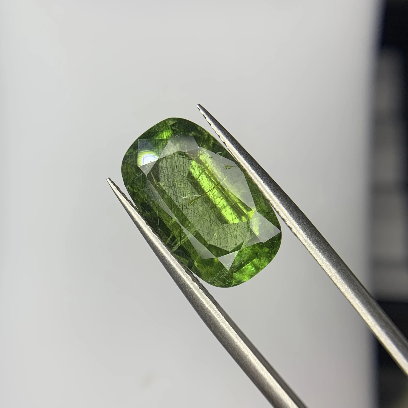8.40ct Natural Peridot with Ludwigite Inclusion in Cushion Shape from Pakistan